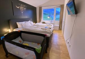Postel nebo postele na pokoji v ubytování Ferienhaus Röns