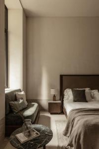 Voodi või voodid majutusasutuse MANNA, a Member of Design Hotels toas