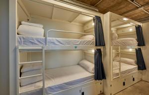 Postel nebo postele na pokoji v ubytování Hostelfly