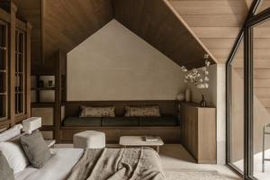 Postel nebo postele na pokoji v ubytování MANNA, a Member of Design Hotels
