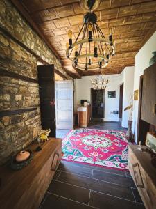 a large bedroom with a large bed in a room at Bujtina Bega in Berat