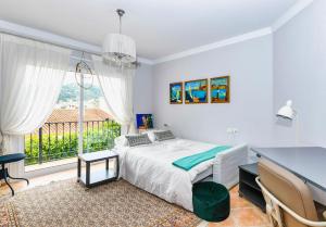 Katil atau katil-katil dalam bilik di Villa Mira Monda