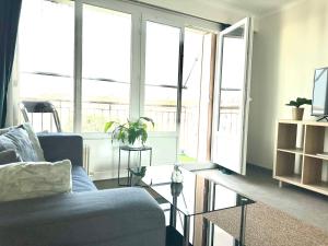 Posezení v ubytování Grand appartement Bron centre proche Eurexpo et Groupama