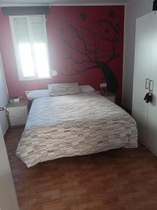 Posteľ alebo postele v izbe v ubytovaní Casa Luis