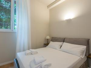 Кровать или кровати в номере I Host Apartment - Ranzoni 2
