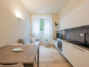 Кухня или мини-кухня в I Host Apartment - Ranzoni 2
