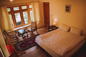 Letto o letti in una camera di Raybo Hostel - Serene stay with 5 mins walk from the main market