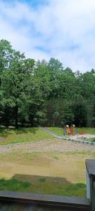 a park with a playground with a play equipment at Апартаменти in Truskavets
