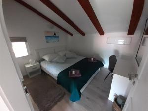 Postel nebo postele na pokoji v ubytování Apartman Sunset