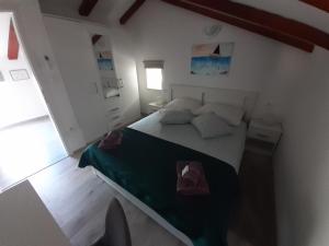 Postel nebo postele na pokoji v ubytování Apartman Sunset