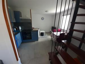 Kuchyň nebo kuchyňský kout v ubytování Apartman Sunset + 25 fotografií