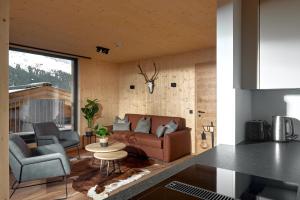 Istumisnurk majutusasutuses Alm-Lodges Montafon by Pferd auf Wolke
