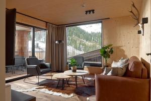Istumisnurk majutusasutuses Alm-Lodges Montafon by Pferd auf Wolke
