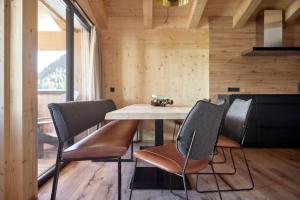 Istumisnurk majutusasutuses Alm-Lodges Montafon by Pferd auf Wolke