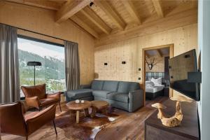 Istumisnurk majutusasutuses Alm-Lodges Montafon by Pferd auf Wolke