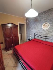 Un ou plusieurs lits dans un hébergement de l'établissement B&B VILLA RITA