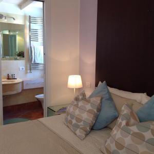 Ένα ή περισσότερα κρεβάτια σε δωμάτιο στο 202 Luxury pool Isola Bella