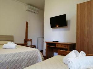 Casa per Ferie Ulivo d'Assisi客房内的一张或多张床位