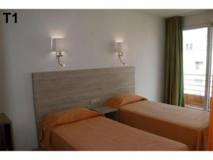 Posteľ alebo postele v izbe v ubytovaní Apartaments Sala Mar