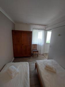Ferienbungalows am Wolziger See客房内的一张或多张床位