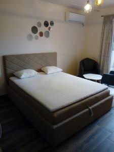 Ένα ή περισσότερα κρεβάτια σε δωμάτιο στο Apartment Petra