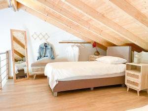En eller flere senge i et værelse på Salthouse Portugal - Stylish Duplex Apartment