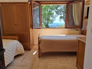 Casa per Ferie Ulivo d'Assisi客房内的一张或多张床位