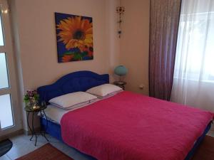 Postel nebo postele na pokoji v ubytování Apartmani Padrov