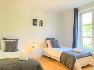Katil atau katil-katil dalam bilik di Two-Bedroom Apartment Located In The Charming City Of Fredericia
