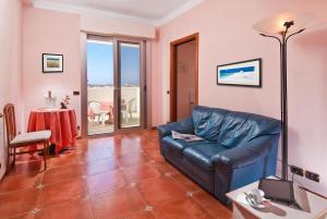 Posezení v ubytování Hotel Le Querce