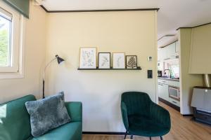 Η κουζίνα ή μικρή κουζίνα στο Gezellig Chalet aan de Veluwse bosrand +17 φωτογραφίες
