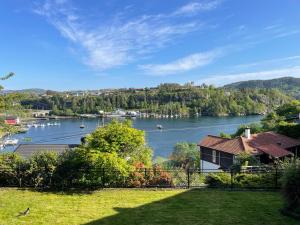 a view of a body of water with boats in it at Apartments Bergen with sea view! in Bergen