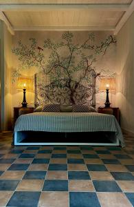 A bed or beds in a room at Podere L'Olmaia