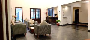 Kuchyň nebo kuchyňský kout v ubytování Hotel Cachar Club