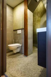 a bathroom with a toilet and a sink at City Design Studio in Alkmaar