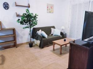 Χώρος καθιστικού στο Casa familiar a pie de piscina