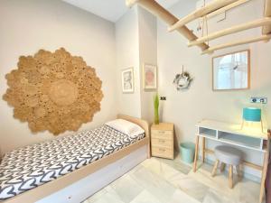 Posteľ alebo postele v izbe v ubytovaní APARTAMENTO COLÓN 1451 - Pleno centro y WIFI Gratis