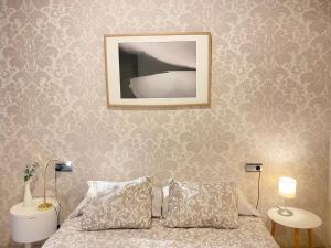 Posteľ alebo postele v izbe v ubytovaní APARTAMENTO COLÓN 1451 - Pleno centro y WIFI Gratis