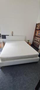 A bed or beds in a room at 2-level BIG space near beach, bars, walking street