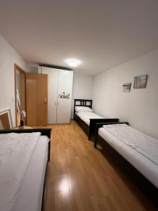 Postel nebo postele na pokoji v ubytování Babal apartment