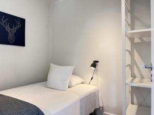 En eller flere senge i et værelse på Three Bedroom Apartment In Rdovre, Trnvej 45b,