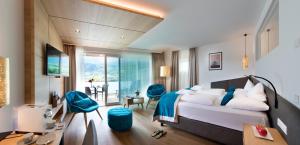 TV in/ali zabaviščno središče v nastanitvi Parc Hotel Am See