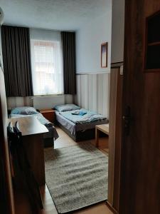 Postel nebo postele na pokoji v ubytování Noclegi Viktor