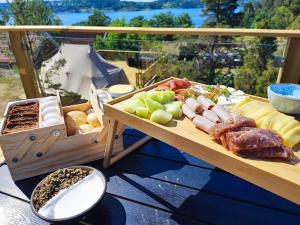 a tray of different types of food on a table at Unda Camping & Resort in Uddevalla