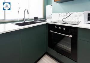Kuchyň nebo kuchyňský kout v ubytování Design apartments in Netanya