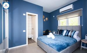 Postel nebo postele na pokoji v ubytování Design apartments in Netanya