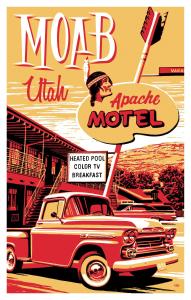an old advertisement for a car parked in front of a motel at Apache Motel in Moab