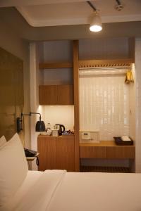 A bed or beds in a room at The Cettia Istanbul