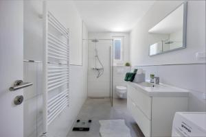 Koupelna v ubytování Apartments Batista + 14 fotografií