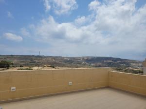 a view from the roof of a building with a view at Azure W B&B in San Lawrenz